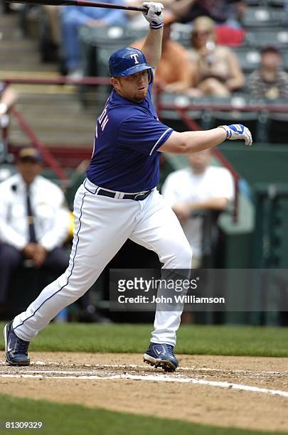 Chris Shelton of the Texas Rangers bats during the game against the Seattle Mariners at Rangers Ballpark in Arlington in Arlington, Texas on May 14,...
