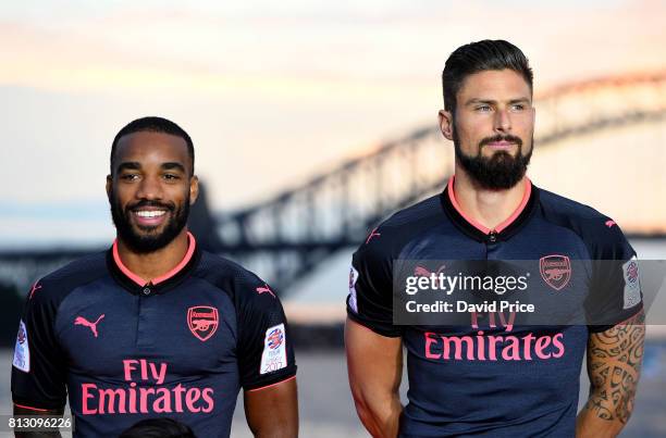 Alexandre Lacazette and Olivier Giroud of Arsenal launch the new Puma Arsenal 3rd kit on Fort Dennison on July 12, 2017 in Sydney, Australia.