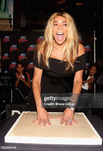 Wendy Williams gets immortalized with her handprints on the wall of fame at Planet Hollywood during a celebration for her Hunter Foundation Charity...