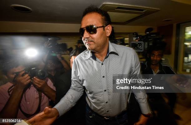 Former Indian cricketer Virender Sehwag arrives for a press conference for Indian cricket team coach at BCCI headquarters, on July 10, 2017 in...