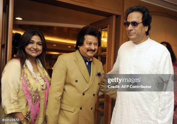 Indian Ghazal singers Mitali Singh Pankaj Udhas and Talat Aziz attend a press conference for the "Khazana Ghazal Festival 2017" in Mumbai on July 12,...