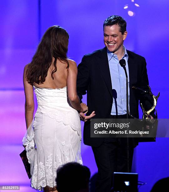 Actor Matt Damon accepts his award from actress Eva Mendes onstage during the taping of Spike TV's 2nd Annual "Guys Choice" Awards held at Sony...