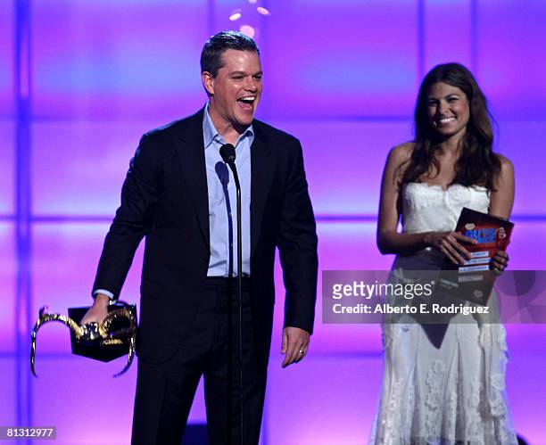Actor Matt Damon accepts his award from actress Eva Mendes onstage during the taping of Spike TV's 2nd Annual "Guys Choice" Awards held at Sony...