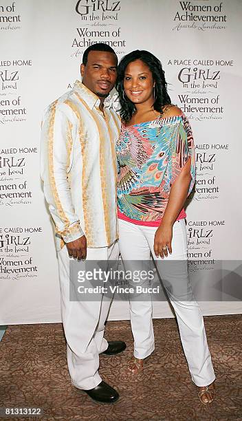 Boxer Laila Ali, who is pregnant, poses with her husband Curtis Conway at A Place Called Home's annual Girlz in the Hood Women of Achievement Awards...