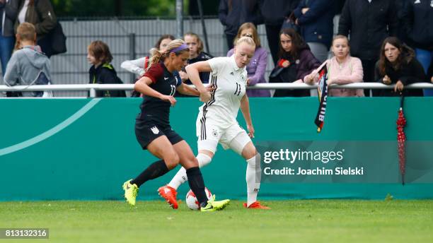 Anna Gerhardt of Germany challenges Emily Fox of USA during the international friendly match between U19 Women's Germany and U19 Women's USA at OBI...