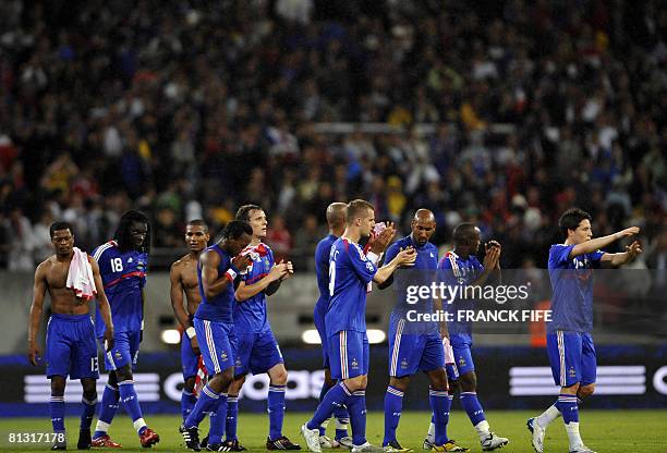 French national football team players leave the pitch at the end of the friendly football match France vs. Paraguay ahead of the Europe 2008...