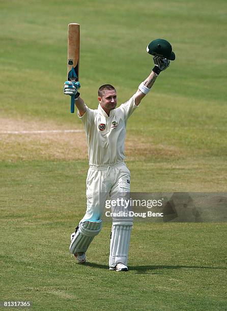 Michael Clarke of Australia reacts after reaching his century during day two of the Second Test match between West Indies and Australia at Sir Vivian...