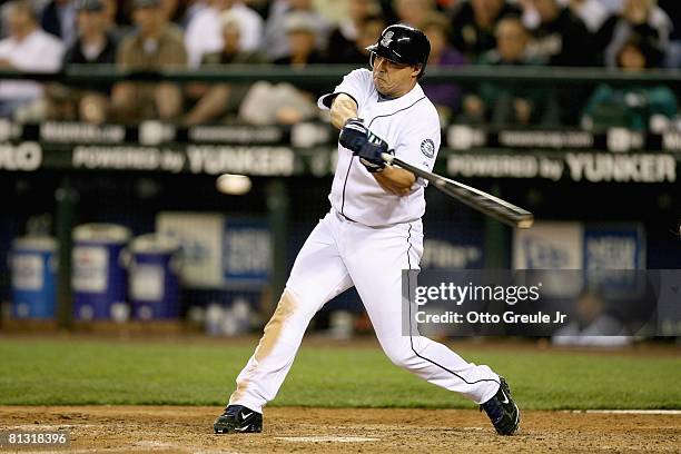 Jose Vidro of the Seattle Mariners swings at a pitch during the game against the Boston Red Sox on May 27, 2008 at Safeco Field in Seattle,...