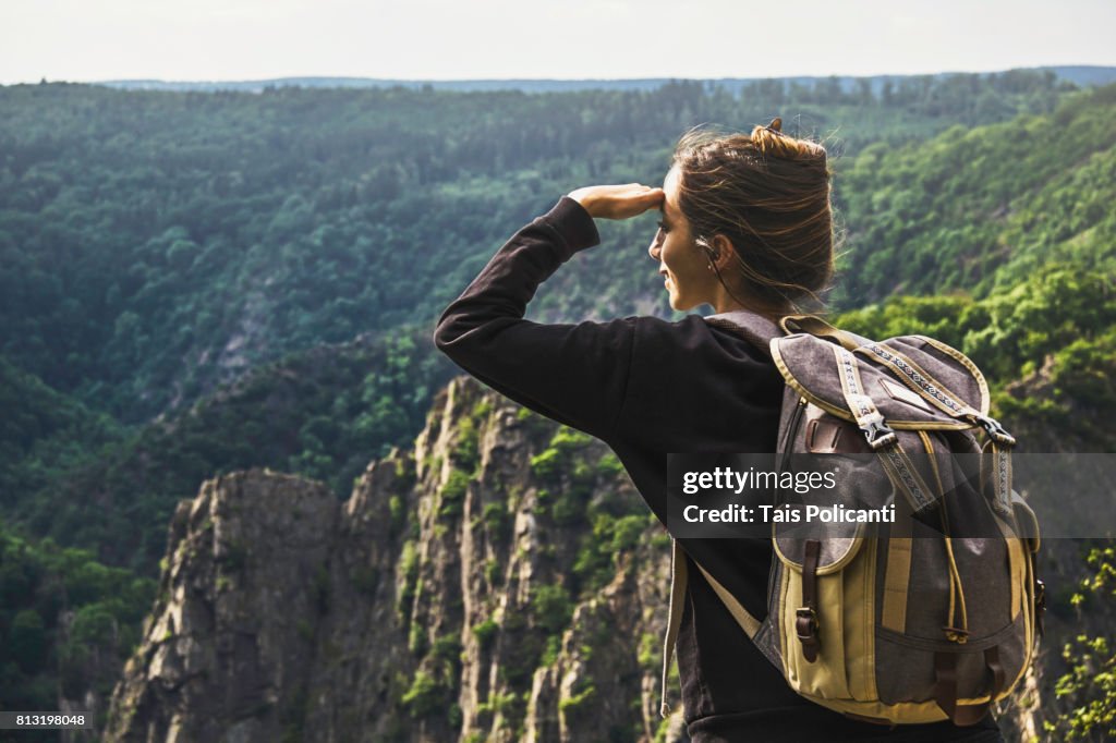 Woman enjoying the view of Bodetal valley in Thale - Hexentanzplatz (Witches' Dance Floor), Harz mountains, Thale, Saxony-Anhalt, Germany