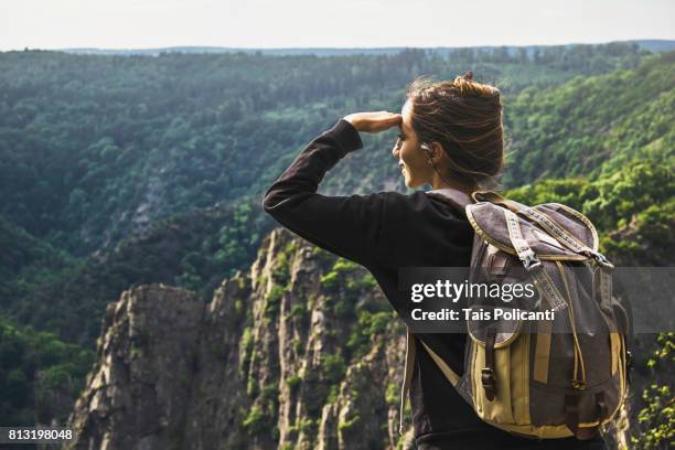 woman enjoying the view of bodetal valley in thale - hexentanzplatz (witches' dance floor), harz mountains, thale, saxony-anhalt, germany - saxony anhalt stock-fotos und bilder