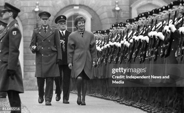 President Mary Robinson inspects a Guard of Honour drawn from the 2nd Infantry Battalion, Cathal Brugha Barracks accompanied by Captain Tom Boyce and...