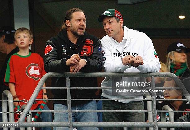 Rabbitohs co-owners actor Russell Crowe and Peter Holmes a Court talk during the round 12 NRL match between the South Sydney Rabbitohs and the St...