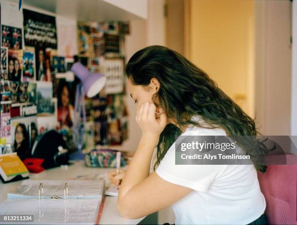 teenage girl studying in her bedroom - one teenage girl only bildbanksfoton och bilder