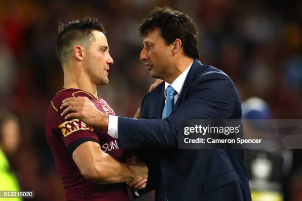 Blues coach Laurie Daley congratulates Cooper Cronk of the Maroons after game three of the State Of Origin series between the Queensland Maroons and...