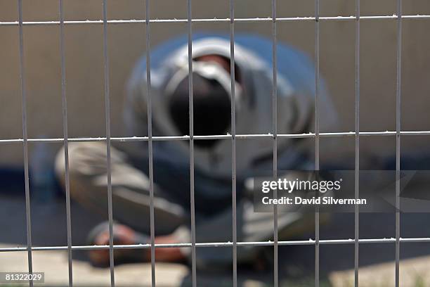 Palestinian man detained by Israeli troops in an overnight operation in the Gaza Strip is left blindfolded and bound at the guardhouse before being...