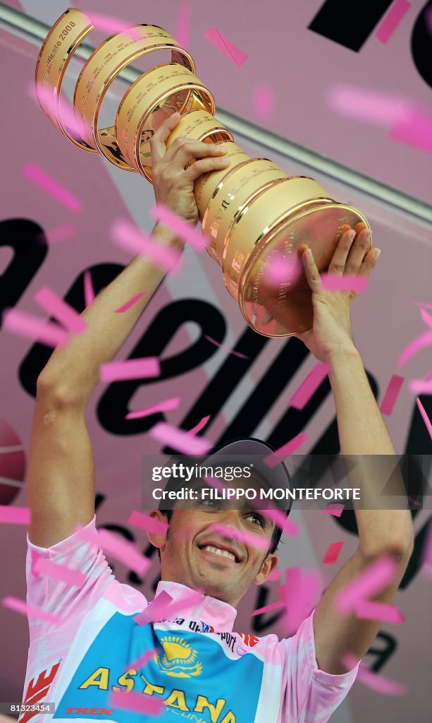 Spain's Alberto Contador holds the Cup o