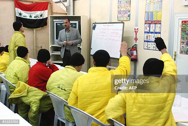 In this photo released by the US Ministry of Defence on June 1 juvenile detainees participate in class at the Dar al-Hikmah juvenile education center...