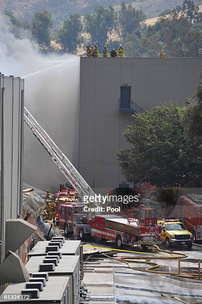 Approximately 400 firefighters from the Los Angeles area battled a huge fire on the backlot of Universal Studios June 1, 2008 in Universal City,...