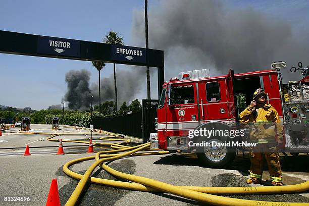 Fire engine is stationed at Gate Four as hundreds of firefighters battle a huge fire on the backlot of Universal Studios on June 1, 2008 in Universal...