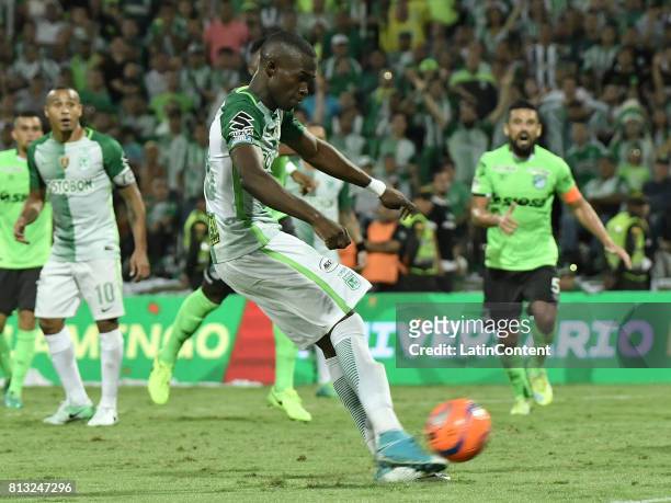 Rodin Quiñones of Atletico Nacional shoots to score the fifth goal of his team during the Final second leg match between Atletico Nacional and...