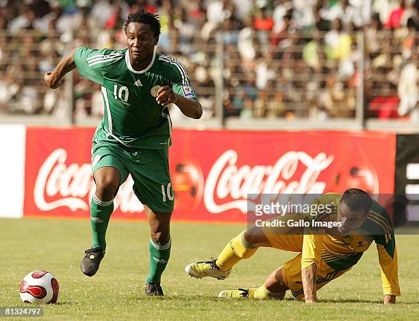Mikel John Obi of Nigeria and Lance Davids of South Africa in action during the AFCON and 2010 World Cup Qualifier between Nigeria and South Africa...