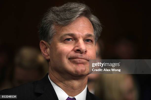 Director nominee Christopher Wray prepares to testify during his confirmation hearing before the Senate Judiciary Committee July 12, 2017 on Capitol...