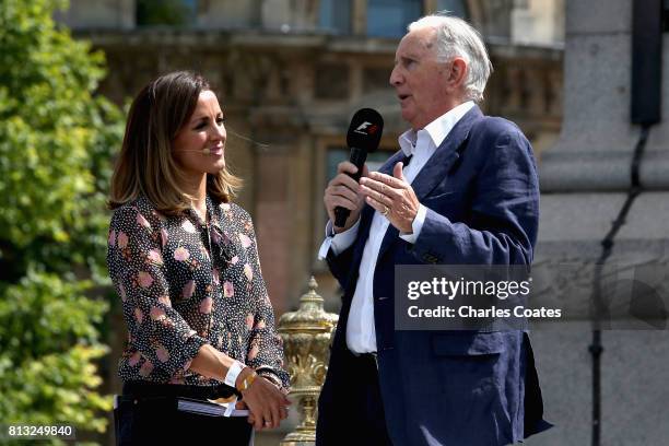 Natalie Pinkham talks with former racing driver John Watson on stage during F1 Live London at Trafalgar Square on July 12, 2017 in London, England....