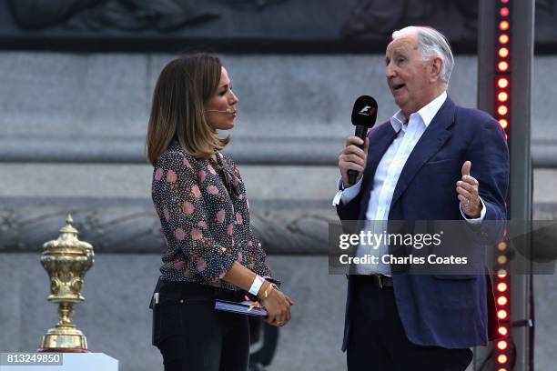 Natalie Pinkham talks with former racing driver John Watson on stage during F1 Live London at Trafalgar Square on July 12, 2017 in London, England....