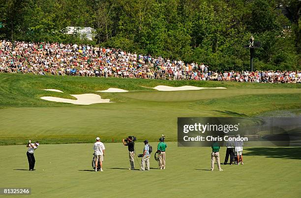 Kenny Perry hits his approach from the 14th fairway during the final round of the Memorial Tournament Presented by Morgan Stanley at Muirfield...