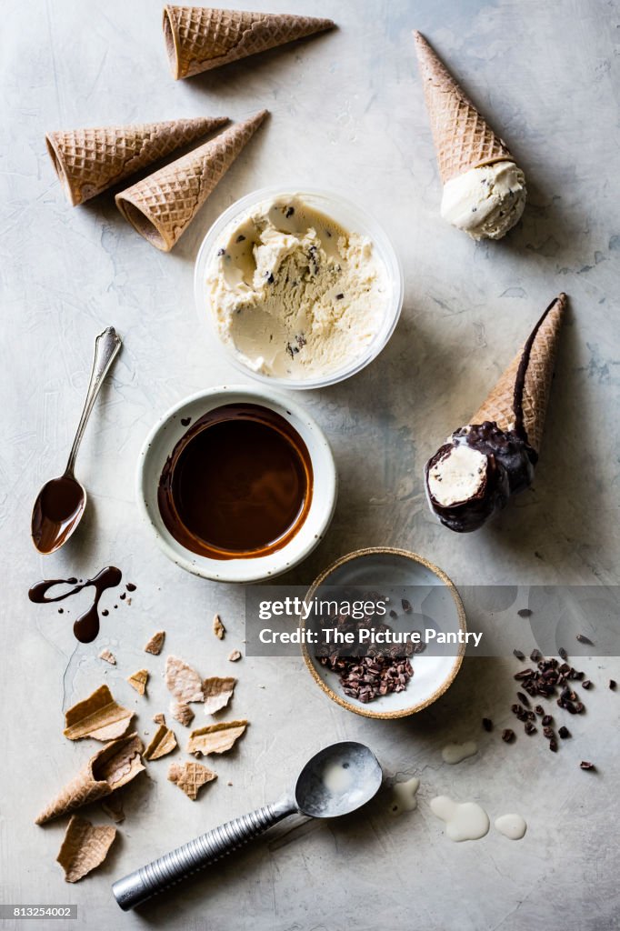 Choc chip ice cream cone dipped in a chocolate sauce