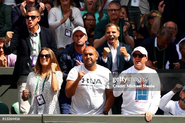 Andy Murray's wife Kim, physio Shane Annun and fitness trainer Matt Little react during his Gentlemen's Singles quarter final match against Sam...