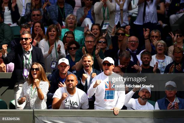 Andy Murray's wife Kim, physio Shane Annun and fitness trainer Matt Little react during his Gentlemen's Singles quarter final match against Sam...