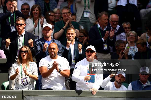 Andy Murray's wife Kim, physio Shane Annun and fitness trainer Matt Little react during his Gentlemen's Singles quarter final match against Sam...