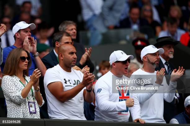 Andy Murray's wife Kim, physio Shane Annun and fitness trainer Matt Little and coach Jamie Delgado react during his Gentlemen's Singles quarter final...