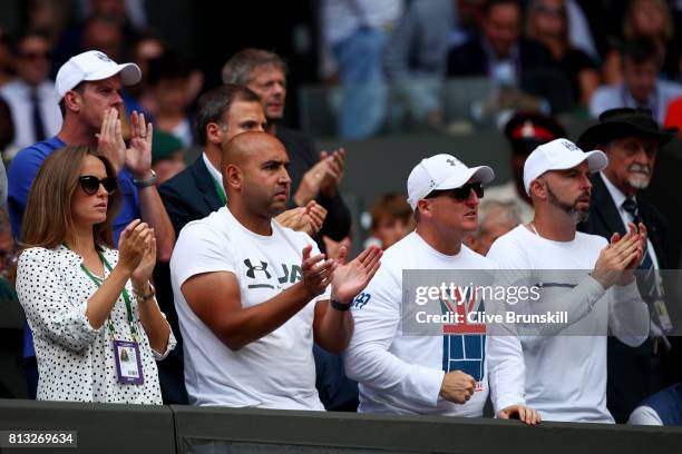 Andy Murray's wife Kim, physio Shane Annun and fitness trainer Matt Little and coach Jamie Delgado react during his Gentlemen's Singles quarter final...