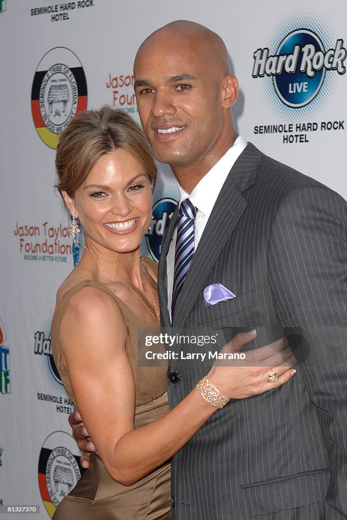 Jason R. Taylor Jason Taylor and his wife Katrina Taylor pose on the red carpet at ...