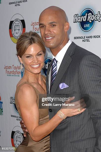Jason Taylor Singer Jason Taylor and his wife Katrina Taylor pose on the red carpet at ...