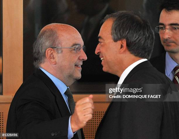 Economic and monetary affairs commissioner Joaquin Almunia talks with Cypriot Finance Minister Charilaos Stavrakis on June 2, 2008 before an...