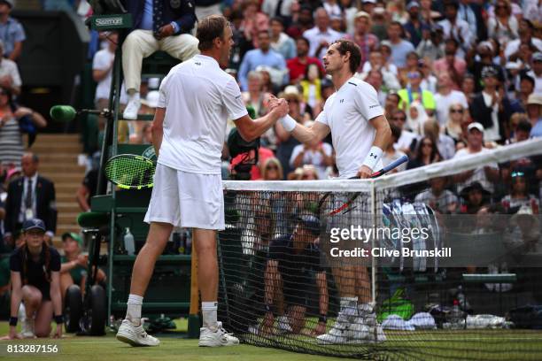 Andy Murray of Great Britain and Sam Querrey of The United States shake hands after the Gentlemen's Singles quarter final match on day nine of the...