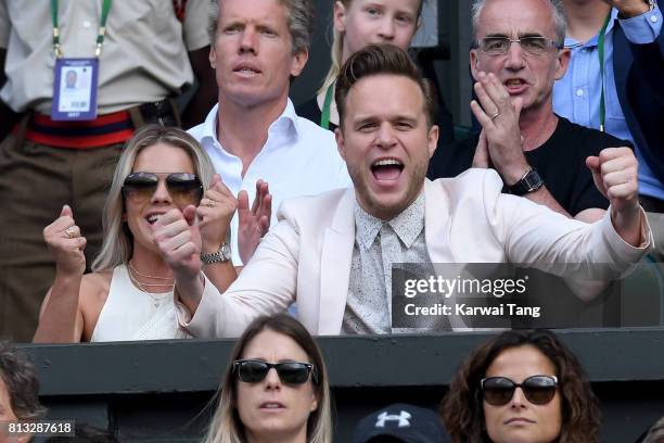 Singers Olly Murs and Louisa Johnson attend day nine of the Wimbledon Tennis Championships at the All England Lawn Tennis and Croquet Club on July...