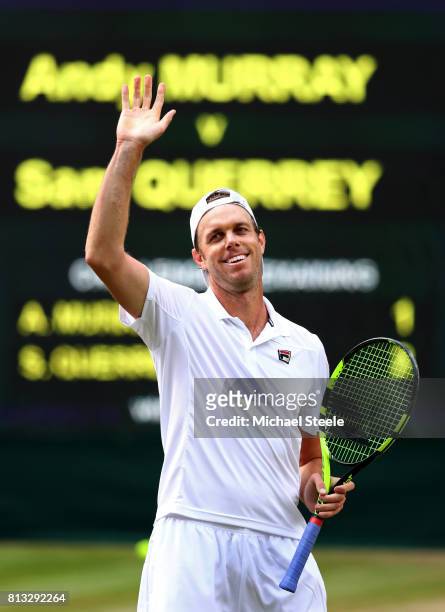 Sam Querrey of The United States acknowledges the crowd as he celebrates victory after the Gentlemen's Singles quarter final match against Andy...
