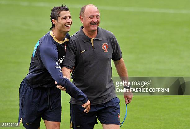 Portugal's football team coach Luiz Felipe Scolari jokes with forward Cristiano Ronaldo during the first training of the squad on June 02, 2008 at...