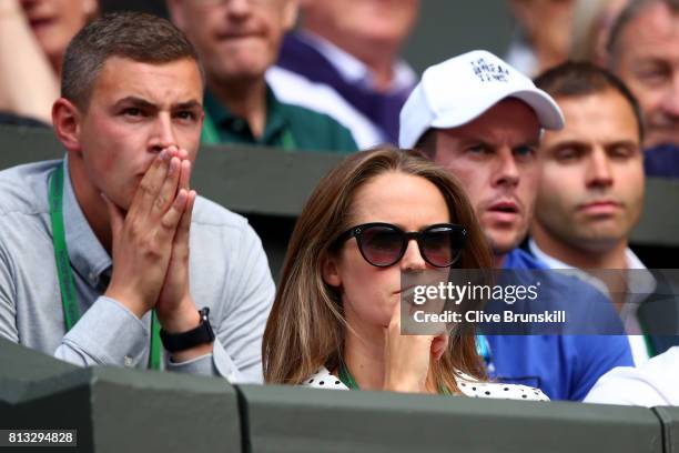 Andy Murray's wife Kim looks despondent during his Gentlemen's Singles quarter final match against Sam Querrey of The United States on day nine of...