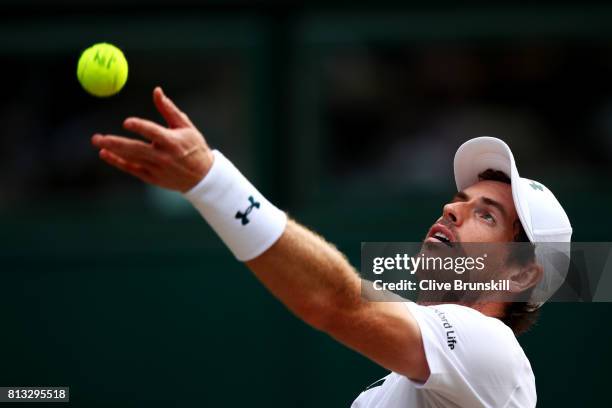 Andy Murray of Great Britain serves during the Gentlemen's Singles quarter final match against Sam Querrey of The United States on day nine of the...