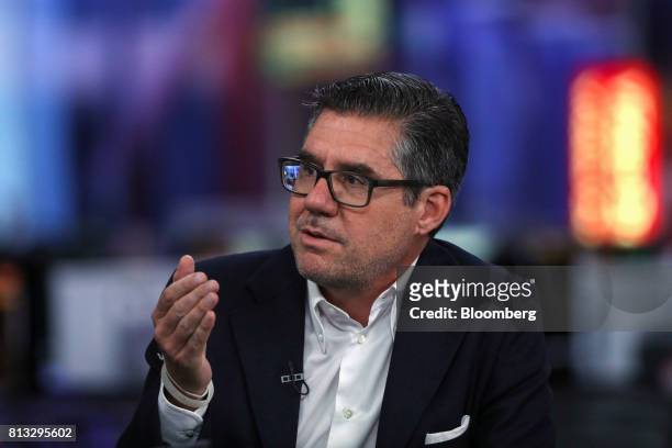 Bob Kunze-Concewitz, chief executive officer of Davide Campari-Milano SpA, gestures while speaking during a Bloomberg Television interview in London,...