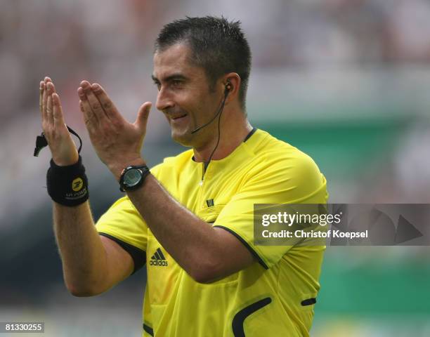 Referee Fredy Fautrel of France gestures during the German international friendly match between Germany and Serbia at the stadium in Gelsenkirchen on...