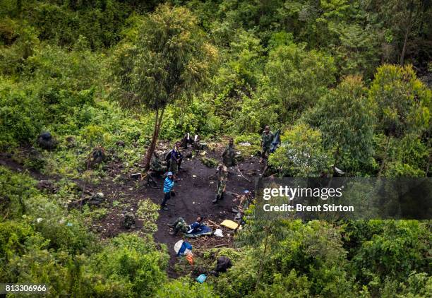 Aerial views of rebel group FDLR's illegal charcoal manufacturing camps inside Virunga National Park. FDLR are the remnants of the Hutu genicodaire's...