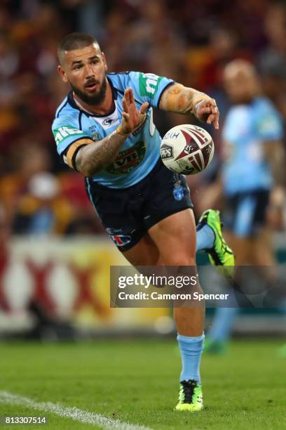 Nathan Peats of the Bluespasses the ball during game three of the State Of Origin series between the Queensland Maroons and the New South Wales Blues...