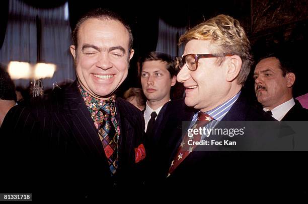 Christian Lacroix and Yves Saint Laurent attend the Miro Exhibition at the Pompidou Center Museum on January 15, 2000 in Paris France.