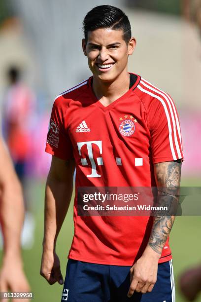 James Rodriguez of FC Bayern Muenchen smiles during a training session at Saebener Strasse training ground on July 12, 2017 in Munich, Germany.